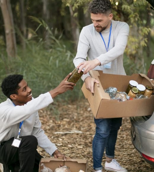 full-shot-volunteers-with-donations