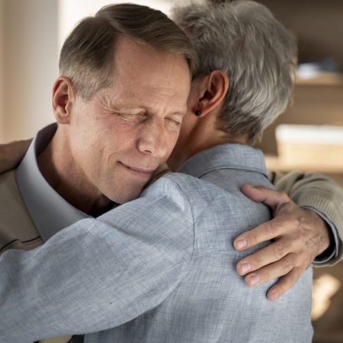 medium-shot-men-hugging